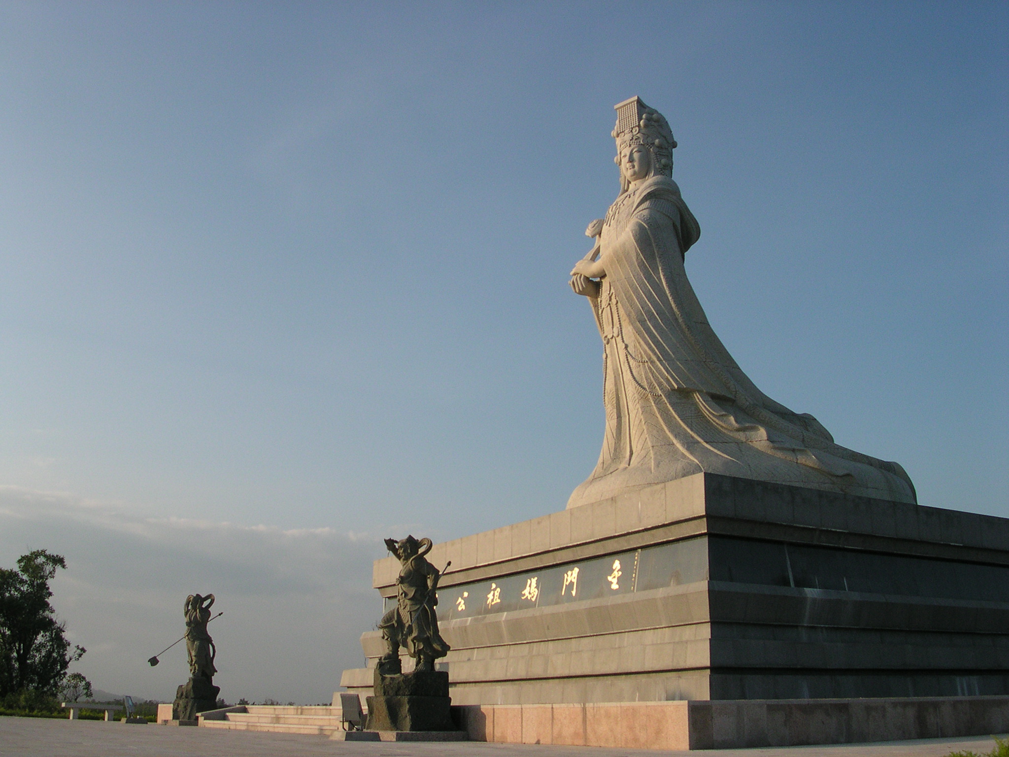 A statue of Mazu, with her two guardian generals.